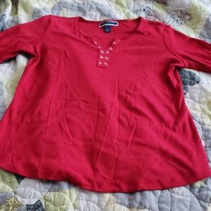 Red shirt with a "v" in the front.